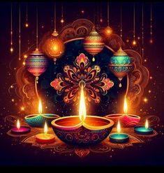 colorful diya with lit candles on dark background