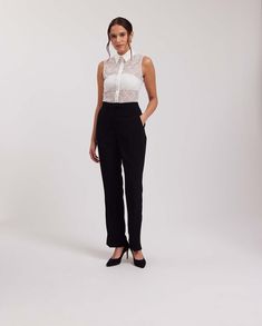 Experience the epitome of effortless elegance with the exquisite EVA shirt from Anne Fontaine. Meticulously handcrafted with delicate lace, this sleeveless white masterpiece showcases the brand's unwavering commitment to exquisite quality and meticulous attention to detail. A cotton poplin collar adds a touch of classic refinement, while a front button placket infuses modernity. Versatile and undeniably sophisticated, this shirt effortlessly transcends trends, standing the test of time as a treasured addition to any discerning wardrobe. Embrace the refined allure and rich European heritage that Anne Fontaine garments embody, and indulge in the pinnacle of luxury and refinement. European Heritage, Sleeveless Button Down Shirt, Shirt Blouses Women's, French Women, Modern Wardrobe, Effortless Elegance, White Sleeveless, Lace Shirt, White Shirts