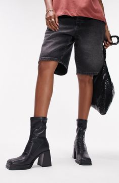 A squared-off toe and flared block heel amplify the contemporary vibe of a back-zip boot with a glossy patent finish. Synthetic upper, lining and sole Imported Black Modern Mid-calf Boots With Square Toe, Modern Square Toe Mid-calf Boots For Spring, Modern Mid-calf Boots With Square Toe For Spring, Modern Spring Mid-calf Boots With Square Toe, Modern Black Mid-calf Boots With Block Heel, Black Mid-calf Boots With Zipper Closure And Square Toe, Black Mid-calf Boots With Zipper And Square Toe, Trendy Mid-calf Boots With Zipper And Square Toe, Trendy Square Toe Heeled Boots With Zipper Closure