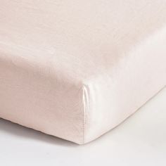 a close up view of the side of a bed sheet