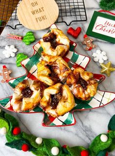 christmas pastries are arranged on a platter