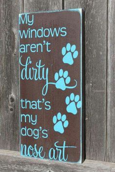 a sign that says, my windows aren't dirty that's my dog's nose art