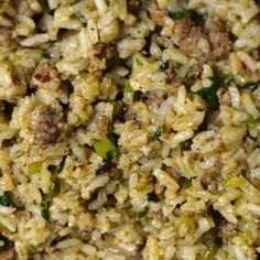 rice with meat and broccoli is shown in this close - up view from above