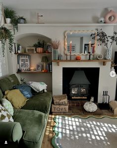 a living room filled with furniture and a fire place