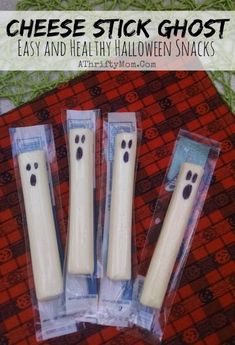 four white ghost candles in plastic packaging on a red tablecloth with the words cheese stick ghost easy and healthy halloween snacks