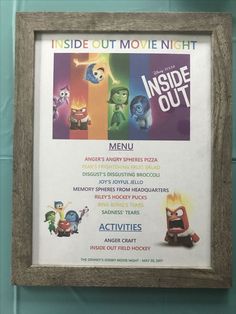 the inside out movie poster is hanging on the wall