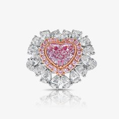 Powerful ring with a GIA Faint Pink Heart shape set in a basket that was plated pink to give it a much pinker look Eye clean 2.70 Carats of surrounding white diamonds & 0.22 Carats Surrounding Pink Rounds Light Pink Heart, Blue Diamond Jewelry, Heart Shaped Diamond Ring, Yellow Diamonds Engagement, Yellow Diamond Engagement Ring, Statement Rings Diamond, Pink Diamonds, Purple Diamond, Heart Diamond