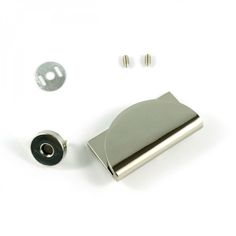 an assortment of hardware and screws on a white background