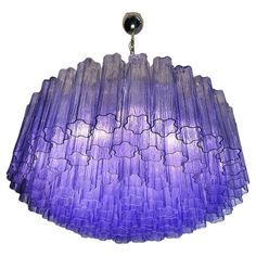 a purple chandelier hanging from the ceiling