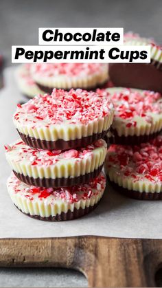 chocolate and red sprinkles are arranged on a cutting board next to candy canes