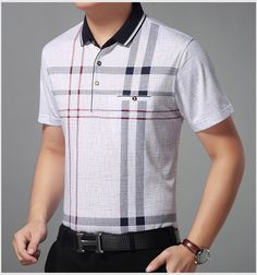 Flaunting a timeless plaid pattern that elevates its visual appeal remarkably, this polo shirt for men is tailored from premium quality cotton that is soft and durable. Fitted with short sleeves for a cool relaxed look, this bodybuilding jersey is perfect for summers. Equipped with a contrast color design and convenient pockets for the smaller items, this breathable polo shirt offers a loose fit that ensures absolute comfort for hours!Specifications Type: LOOSE Tops Type: Polos Style: Casual Sle Summer Plaid, Fits With Shorts, Polo Shirt White, Mens Tee Shirts, Plaid Shorts, Loose Tops, Camisa Polo, Short Sleeve Polo, Mens Polo Shirts