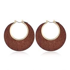 PRICES MAY VARY. Material: Made of natural wood, lightweight, comfortable to wear, protect your sensitive skin The earrings diameter: 1.97''. The earring consists of round wooden circle.Maybe become your first wooden earring among your many earrings, Of cause, if you like it. The wooden earrings is a simple, stylish and lightweight earrings are a good choice, it makes you attractive and unique. PERFECT DESIGN: Classic style,Vintage and elegant and simple elegance with the warmth of natural wood, Wood Hoop Earrings, Laser Cut Wood Earrings, Afrikaanse Mode, Boho Chic Earrings, Brown Earrings, Boho Handmade, Wooden Hoop, Chic Earrings, Drop Dangle Earrings