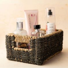 a basket filled with personal care items on top of a table