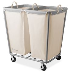 two canvas storage bins on wheels with handles