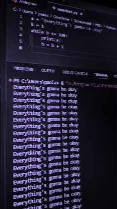 a computer screen with the program code displayed on it's back side, in front of a dark background