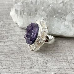 Druzy amethyst ring adjustable Sterling silver Purple raw crystal ring victorian style filigree ring handmade artisan ring made in Armenia 【FULL DETAILS】 ► Gemstone: natural druzy amethyst ► RING SIZE: adjustable (but choose from the option) ► RING WEIGHT: 19.9 gr (0.043 lb) All our jewelry is crafted with great attention to detail! We strive to provide you the best quality, modern design, and perfect look!! All our jewelry is made of high-quality sterling silver and is stamped with a 925 stamp Victorian Amethyst Ring For Gift, Victorian Amethyst Ring As Gift, Victorian Amethyst Ring Gift, Adjustable Amethyst Ring With Natural Stones For Anniversary, Handmade Adjustable Oval Amethyst Ring, Ornate Amethyst Ring As A Gift, Handmade Silver Amethyst Ring For Wedding, Unique Silver Amethyst Ring With Adjustable Fit, Handmade Spiritual Filigree Ring For Anniversary