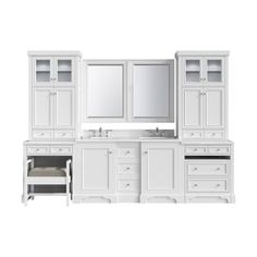 a white bathroom vanity with two sinks and mirrors