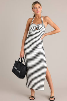 Elevate your style with our Contrast Couture Black Stripe Halter Maxi Dress. Featuring a playful halter top and contrasting stripes, this dress is perfect for any occasion. Show off your unique fashion sense and turn heads wherever you go. This stripe maxi dress features a self-tie halter neckline, twist detailing in the bust, a chest cutout, an open back, a textured material, and a side slit. Halter Bridesmaid Dress, Rush Dresses, Cardigan Crop Top, Halter Maxi Dress, Dress Bra, Halter Maxi, Striped Maxi, Halter Maxi Dresses, Black Dresses Casual