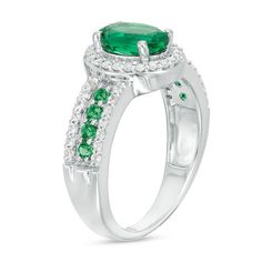 Amp up the fashion volume with this gorgeous fashion ring. Crafted in sterling silver, this resplendent design showcases an 8.0 x 6.0mm oval-shaped lab-created verdant-green emerald wrapped in a shimmering frame of petite lab-created white sapphires. The luxurious shank sparkles with a row of 1.9mm created emeralds bordered in petite created white sapphires. Polished to a bright shine, this choice is a standout style. Custom-made to fit her ring size. Sterling silver rings cannot be resized after purchase. Frame Ring, Resize Ring, Her Ring, Lab Created Emerald, Peoples Jewellers, Emerald Stone, Fashion Ring, Sapphire Stone, Precious Jewelry