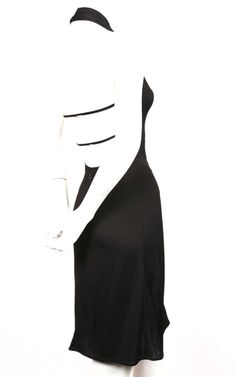 For Sale on 1stDibs - Very rare, jet-black halter style dress designed by Azzedine Alaia dating to 2001 as seen in numerous places including; Karolina Kurkova as photographed Evening Slip Dress With Fitted Bodice And Halter Neck, Fitted Silk Halter Dress With Bias Cut, Fitted Silk Halter Dress For Formal Occasions, Evening Slip Dress With Bias Cut And Stretch, Black Slip Dress With Fitted Bodice For Gala, Black Slip Dress With Fitted Bodice For Evening, Fitted Halter Neck Cocktail Slip Dress, Black Backless Slip Dress For Gala, Elegant Fitted Black Halter Dress