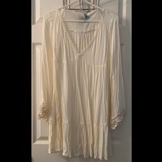 Never Worn. Still Has Original Tags Attached. Very Light & Flowy. Will Most Likely Need To Be Worn With A Slip (It’s Fairly See-Through). The Bell-Sleeves Make This Dress Super Bohemian. Would Look Amazing With A Pair Of Strappy Sandals Or Cute Wedges! Flowy V-neck Boho Dress With Lace Trim, Beige 3/4 Sleeve Dress For Vacation, Summer Long Sleeve Mini Dress With Lace Trim, Flowy Boho Tunic Dress For Brunch, Flowy Mini Dress With Lace Trim For Fall, Fall Mini Dress With Lace Trim And Flowy Fit, Flowy Fall Mini Dress With Lace Trim, Bohemian Long Sleeve Dress With Lace Trim, Cream Long Sleeve Mini Dress For Beach