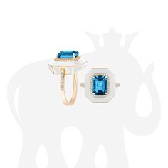 JR0271-LBT-ENWH-Y 'Queen' London Blue Topaz Emerald Cut Ring with White Enamel and Diamonds in 18K Yellow Gold Stone Size: 9 x 7 mm Approx. gemstone Wt: 2.60 Carats (London Blue Topaz) Diamonds: G-H / VS, Approx Wt: 0.23 Carats Luxury White Gold Octagon Topaz Ring, Luxury Topaz Ring With Halo Setting, Luxury 14k Gold Topaz Ring, Luxury Yellow Gold Octagon Topaz Ring, Luxury Blue Topaz Ring With Polished Finish, Luxury Polished Blue Topaz Ring, Luxury White Blue Topaz Jewelry, Luxury White Gold Blue Topaz Gemstones, Luxury Octagon Topaz Ring As A Gift