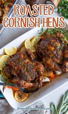 roasted cornshens with lemons, carrots and herbs on a white platter