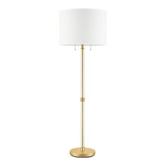 a gold floor lamp with a white shade