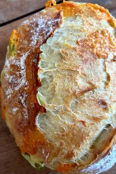 a close up of a pastry on a wooden table