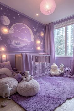 a baby's room decorated in purple and white