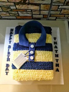 a birthday cake that looks like a shirt and tie