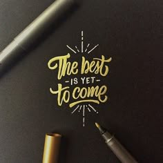 the best is yet to come written on a piece of paper next to a fountain pen