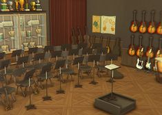 a room filled with lots of chairs and guitars