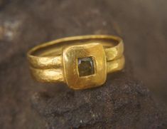 24k gold dark yellow diamond ring//24k artisan square diamond ring//unique statement gold ring//24k solid gold hand made diamond ring//artisan gold ring Not many rings stayed long enough on my hand, this one is my longest, and that's why I want to share it's beauty with you all. It's breathtaking .  This ring showcases a sophisticated dark yellow diamond, adding a touch of elegance and individuality. The unique hue of the gray diamond contrasts beautifully with the warm tones of the gold. Dark y Ring With Square Stone, Gold Rectangular Ring With Single Diamond, Rectangular Gold Ring With Single Diamond, Rectangular Gold Rings With Rose Cut Diamonds, Gold Diamond Ring With Rectangular Shape, Gold Rectangular Diamond Ring With Single Diamond, Gold Diamond Ring With Single Rectangular Diamond, Gray Diamond Ring, Statement Gold Ring