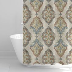 a shower curtain with an ornate design on the front and back side, in beige