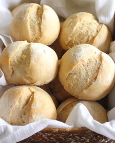 a basket filled with loaves of bread