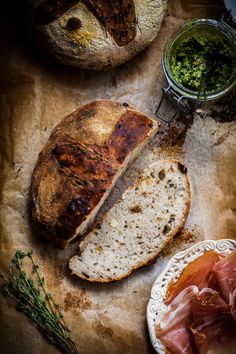 bread, meat and vegetables on a table