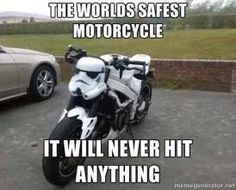 a star wars storm trooper riding on the back of a motorcycle next to a silver car