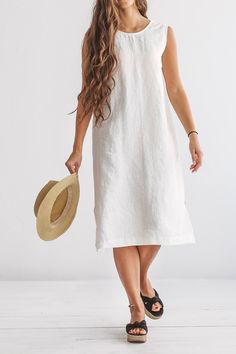 "DESCRIPTION: ♥ 100% natural European linen; ♥ safe Oeko-TEX® Standard 100 certified linen fabric ♥ softened midweight linen (185 g/m2) ♥ sleeveless dress FIT ♥ length from the lower to the upper seam is about 41.3 inches / 105 cm ♥ measurements taken from a size S ♥ model with long hair is 170 cm and wearing a size S ♥ model with shorter hair is 173 cm and wearing a size S SIZE CHART: XS: Bust 30.7\"- 32.7\" (78-83 cm) , Waist 23.6\"- 25.6\" (60-65 cm), Hips 33.5\"- 35\" (85-89 cm) S: Bust 33\" Summer Beige Linen Midi Dress, Casual Linen Sleeveless Dress For Daywear, Casual Summer Dresses In Natural Color, Knee-length Unlined Midi Dress For Summer, Casual Natural Color Summer Dresses, Unlined Knee-length Midi Dress For Summer, Linen Unlined Midi Dress For Daywear, Casual Sleeveless Linen Vacation Dress, Casual Sleeveless Linen Dress For Vacation