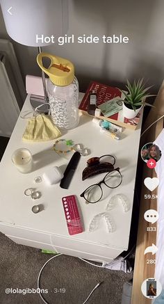 a white table topped with glasses and other items