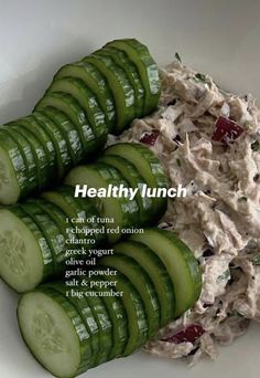 cucumber slices arranged in a bowl with the words healthy lunch written below it