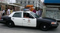 a police car is parked on the street