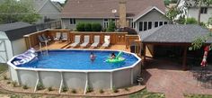 an above ground swimming pool in a backyard