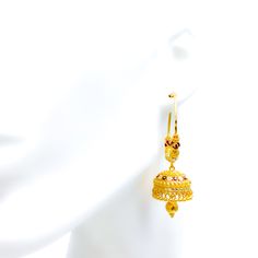 These 22k gold Bali earrings, weighing 19.6 grams, dazzle with a palatial bright chandelier Meena design. They boast a yellow gold finish, a diameter of 1.3 inches, and a length of 2.5 inches. Perfect for those who appreciate intricate designs and substantial statement pieces, these earrings are designed to captivate and charm, making them ideal for sophisticated gatherings and grand celebrations. Product Details Gold Purity(karat): 22k Gold Weight(grams): 19.6 Item Finish: Yellow Gold Earring Style: Bali/Hoop Earring Earring Diameter: 1.3" Earring Length: 2.5" Gold Fusion Hoop Earrings With Latkans, Fusion Style Yellow Gold Chandbali Jhumkas, Gold Fusion Dangle Jhumkas, Festive 22k Yellow Gold Chandelier Earrings, Fusion Style Yellow Gold Jhumkas For Celebration, Fusion Style Yellow Gold Earrings With Tilla, Yellow Gold Fusion Jhumkas For Celebration, Ceremonial Yellow Gold Tilla Earrings, Gold Fusion Danglers With Tilla