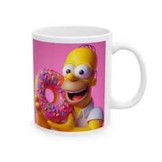 the simpsons holding a donut with sprinkles on it's face