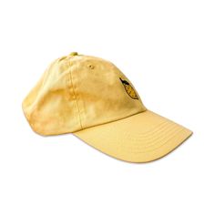 Meet your new go-to accessory: our unstructured cap with a quirky embroidered lemon! Featuring an antiqued brass side buckle for a relaxed, casual look, this hat adds a fun twist to any outfit. Ideal for those who love unique and playful fashion, it’s one size fits most, so everyone can enjoy the style! Trendy Adjustable Yellow Dad Hat, Yellow Cotton Dad Hat With Curved Brim, Yellow Cotton Curved Brim Dad Hat, Yellow Casual Dad Hat For Spring, Casual Yellow Dad Hat For Spring, Trendy Yellow Snapback Dad Hat, Vintage Curved Visor Summer Hat, Yellow Casual Baseball Cap With Short Brim, Casual Yellow Hat With Curved Visor