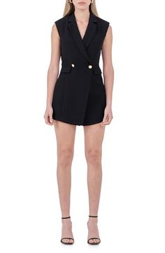 Traditional tailored suiting gets a warm-weather update in this double-breasted romper that finishes with a demure peekaboo cutout at the lower back. Padded shoulders and goldtone buttons wink at the '80s inspiration of the look without getting too campy. Front button closure Notched lapels Sleeveless Front welt pockets Lined 100% polyester Hand wash, dry flat Imported Summer Party Double-breasted Blazer Dress, Fitted Double-breasted Blazer Dress For Summer, Summer Pantsuit With Buttons, Summer Workwear Pantsuit With Buttons, Chic Summer Double-breasted Blazer Dress, Chic Blazer Dress With Gold Buttons, Summer Blazer Dress With Buttons For Date Night, Summer Date Night Blazer Dress With Buttons, Summer Blazer Dress With Buttons For Night Out