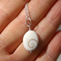 Spiral Cat Eye Shell Eye of Shiva Necklace by HaoleGirlHaiku Available on www.Etsy.com/shop/HaoleGirlHaiku Adjustable White Spiral Jewelry, White Adjustable Spiral Jewelry, Handmade White Spiral Necklaces, Shiva Necklace, Sea Shell Necklace, Shiva Eye, Necklace Shell, Beach Hawaii, Beach Boho