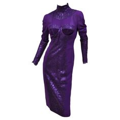 New Tom Ford Metallic Amethyst Lace Cocktail Dress It size 40 - US 4 92% Silk, 8% Elastane Fully lined, attached padded bra inside. Zipped sleeves, back zip closure. Velvet and Lace detail. Length 44", Bust 36", Waist 28", Hips 36" (fabric is stretchy). New with tags. Luxury Fitted Purple Dress, Fitted Purple Silk Dress, Wisteria Purple, Silk Dressing Gown, Lace Cocktail Dress, Cocktail Dress Vintage, Atelier Versace, Designer Evening Dresses, Evening Dresses Cocktail