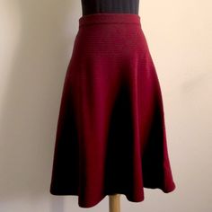 Wool Burgundy Midi Skirt Feminine Flare With A-Line Silhouette Unlined Condition Is Nwot Super Cute And Warm 86% Wool 15% Polyester Waist 13.5” Laid Flat, Has A Lot Of Stretch Length 26.5” Questions? Leave A Comment Below! Remember To Bundle And Save! Chic Burgundy Midi Skirt, Red Flared Skirt For Work, Red Flowy Skirt For Workwear, Burgundy Flared Lined Skirt, Red A-line Skirt For Workwear, Red A-line Skirt For Work, Fitted Burgundy Flared Skirt, Chic Burgundy Skirt For Work, Elegant Lined Burgundy Skirt